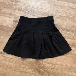 Black pleated mini skirt, never been worn